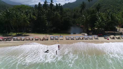 Aerial-Shot-Beach-Bay---Aragua-Venezuela,Truck-Left-Along-Beach