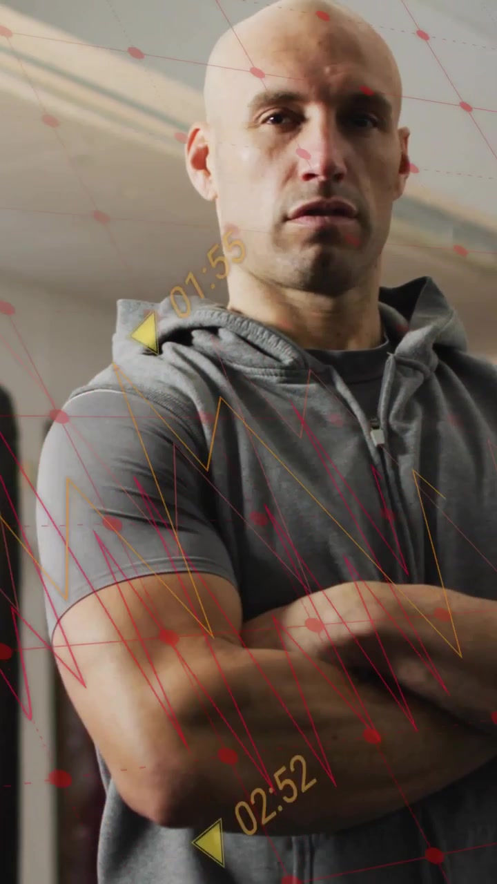 Vertical video: HUD appearing guiding athlete arms crossed glancing and analyzing form for training