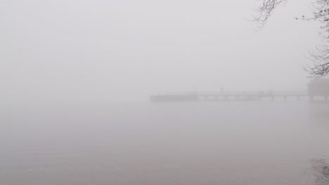 loch lomond pier on a misty evening