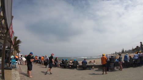 Time-lapse-of-people-walking-on-a-walkway-next-to-the-beach-in-Namibia