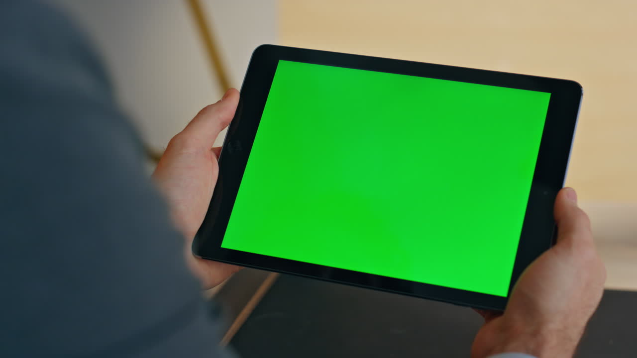 Manager looking greenscreen tablet company office closeup. Businessman working