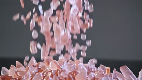 pink crystals falling