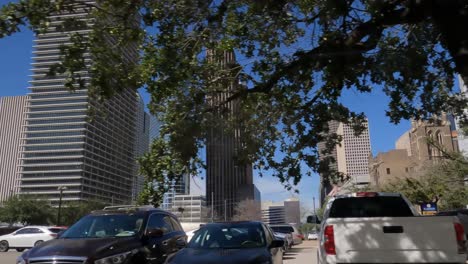 houston, texas usa, driving in downtown district, car passenger pov of streets and buildings