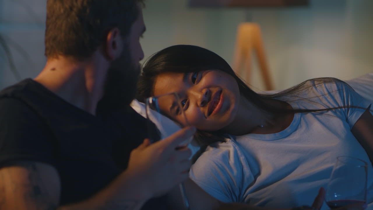 Couple Relaxing at Home, Nighttime Conversation