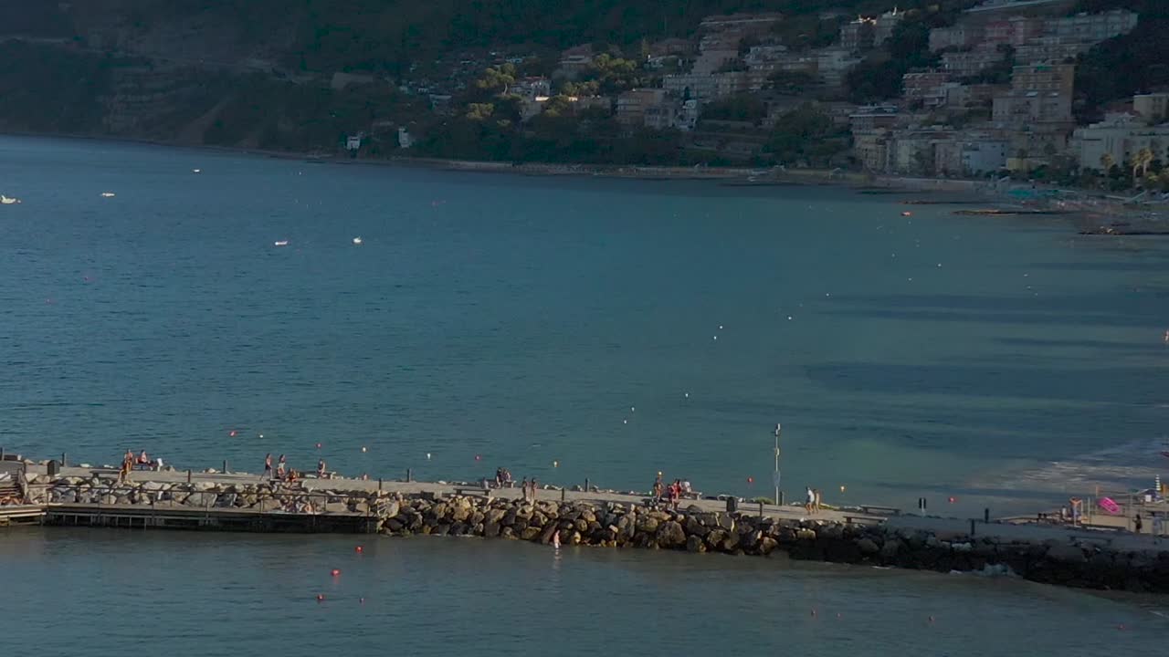 drone flying above the coast of Laigueglia, Liguria