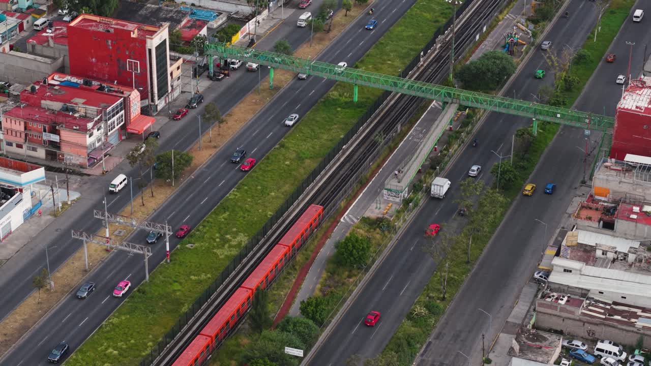 Aerial shots of CDMX metro over an avenue in Ecatepec, Mexico