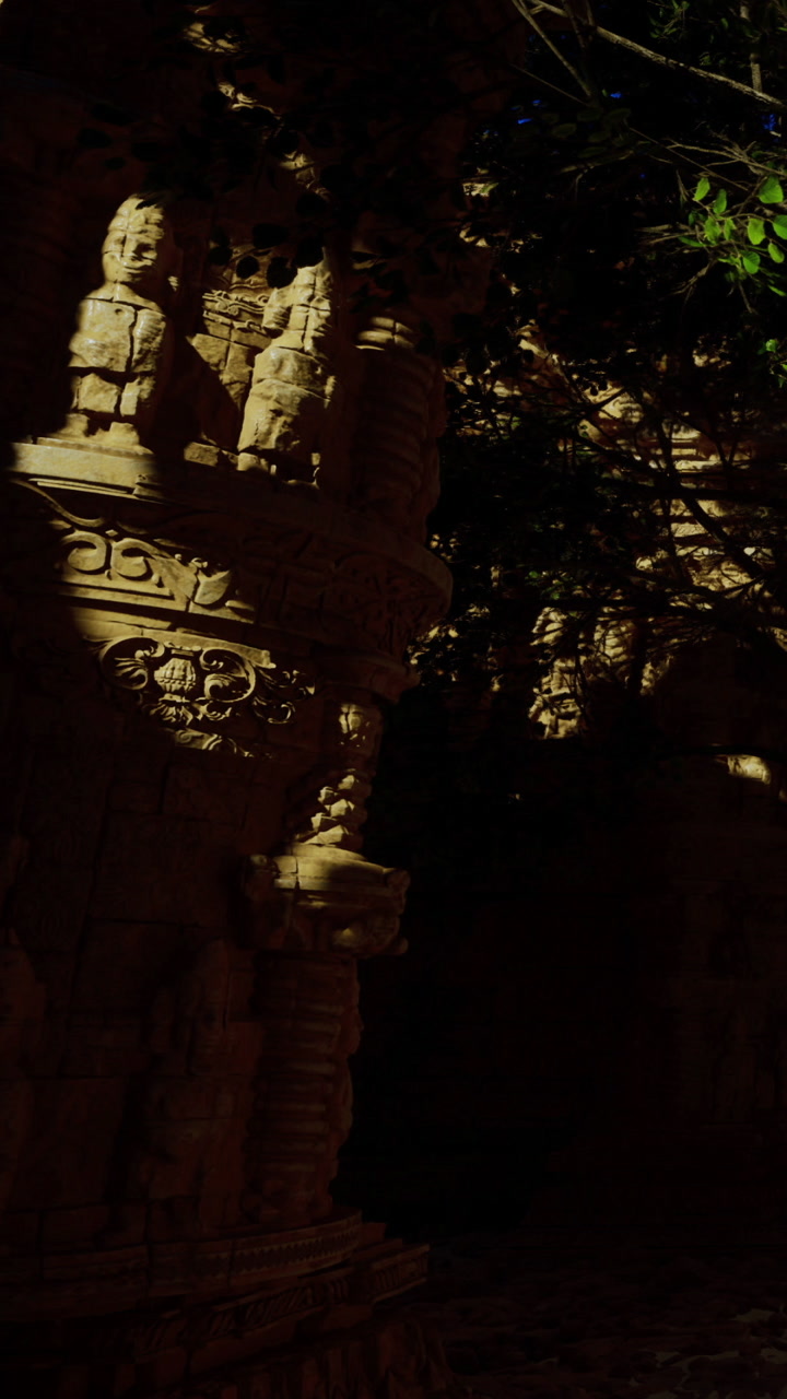Ancient stone carvings in dark setting highlight historical artistry
