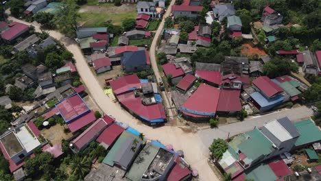 aerial of rural village son la province vietnam drone over homes roof southeast asia