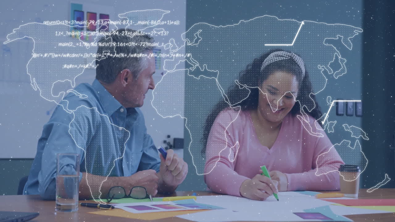 Two people working at desk with world map and data overlay animation
