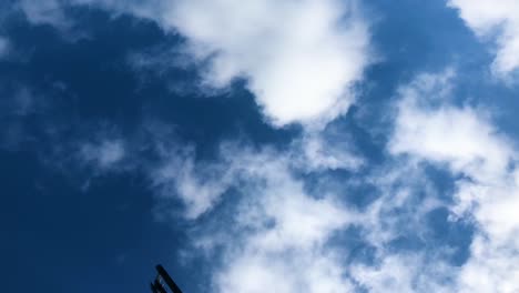 the sails of a dutch windmill, slowly rotating against a sunny sky | haarlem, holland | hd at 30 fps