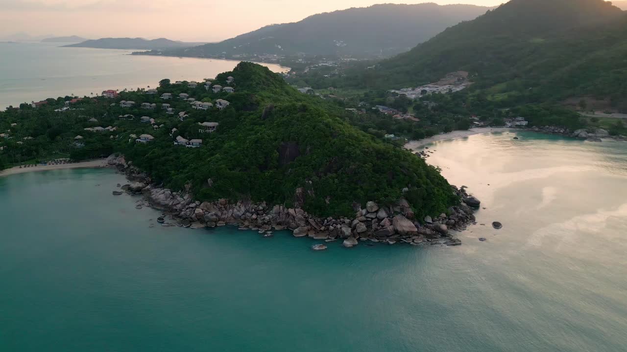 Turquoise water shore of Thailand's Koh Samui Coral Beach Aerial Establishing of green cliff islands, southeast tropical Asia