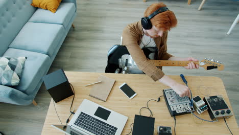 Musician Recording Music at Home