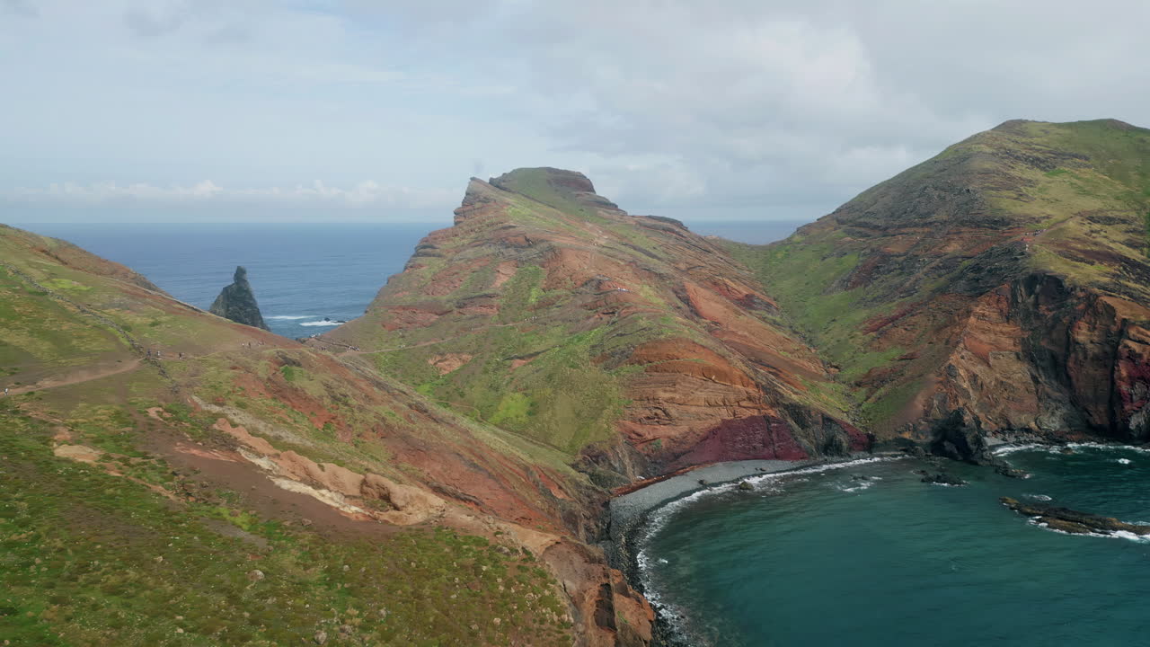 Drone volcanic island lagoon on summer day. Picturesque scenery of cliffs coast