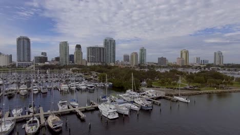 4k aerial drone video of sailboats and yachts at municipal marina on tampa bay in downtown st