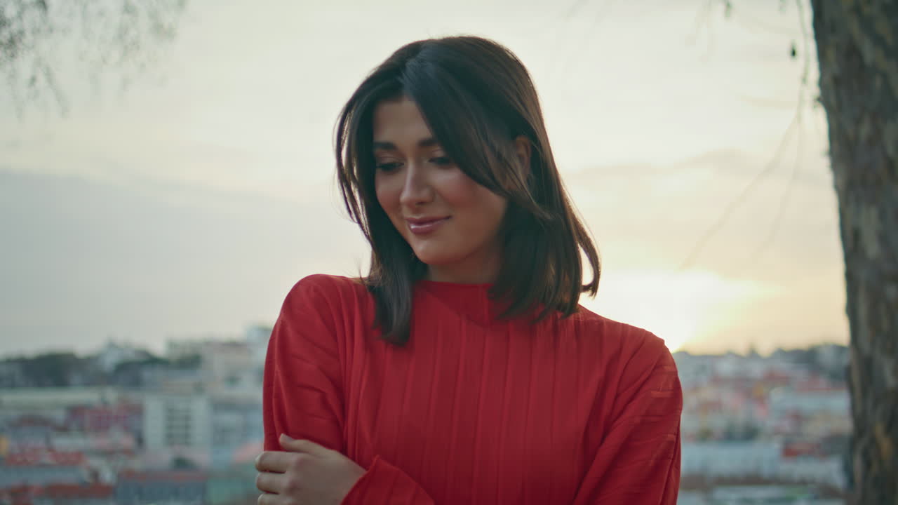 Carefree girl enjoy nature beauty standing sunset cityscape park alone closeup