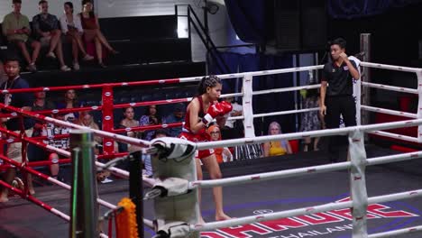 a female fighter prepares for a match