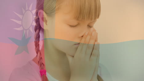 praying over taiwan flag colors, child with braided hair in school animation