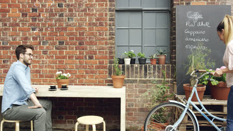 couple dating drinking coffee in cafe