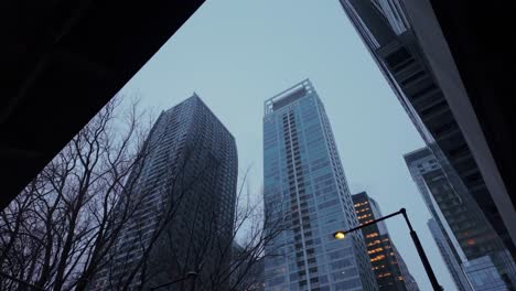 downtown montreal architecture, upward view of glass and steel buildings