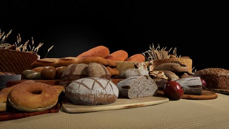 different types of fresh bread on table, black background