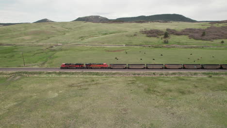 coal train moves through remote midwest farmland