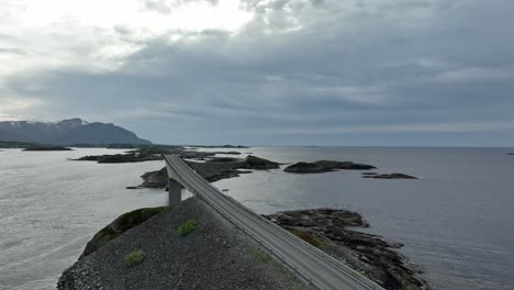 wide aerial view of storseisundet bridge on famous atlantic ocean road