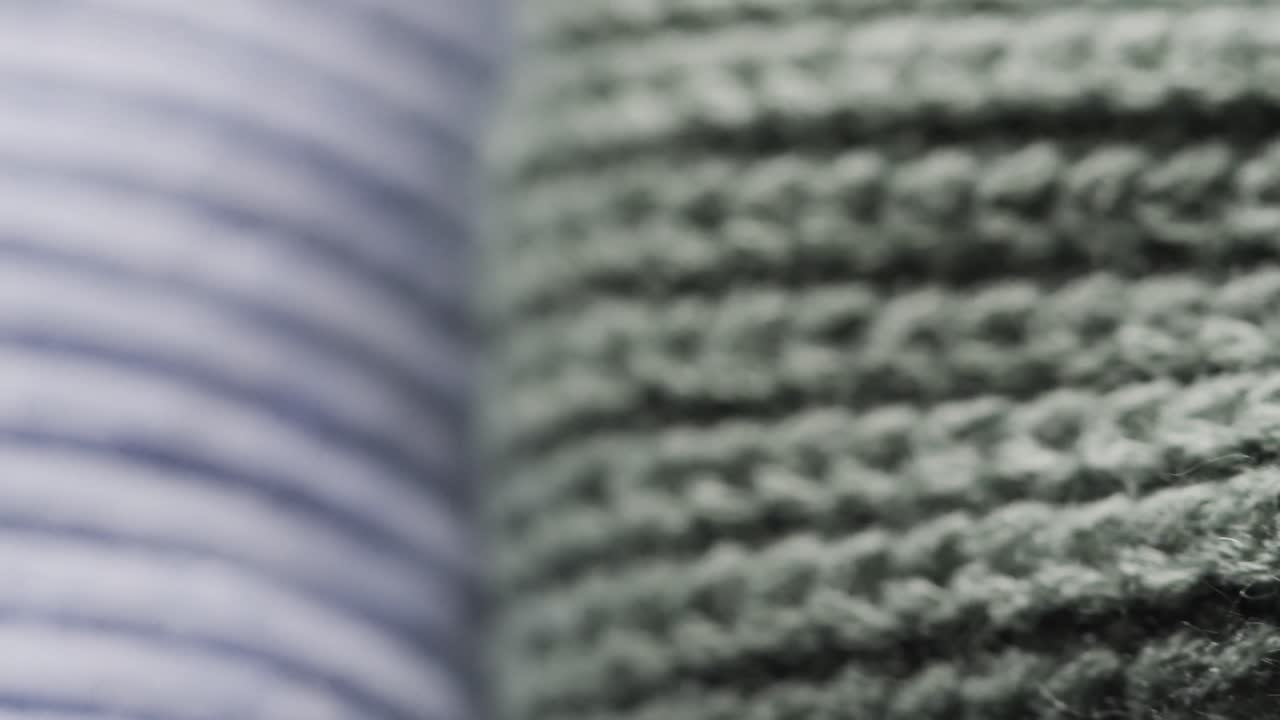 복사 공간과 함께 파란색과 녹색의 양털 크로 ⁇  천의 클로즈업의 마이크로 비디오