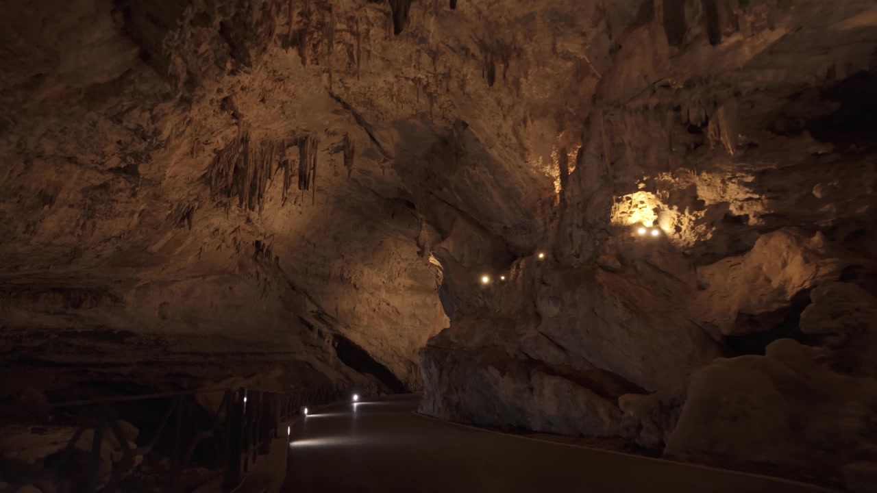 Walking Along The Pathway Inside Grotta di San Giovanni, A Natural Cave In Sardinia, Italy. POV Shot