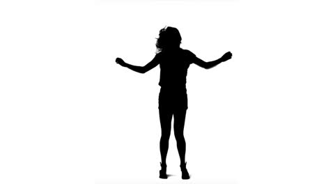 woman silhouette dancing in slow motion