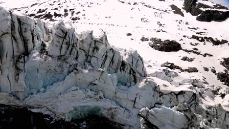 aerial take of argentière glacier in the french alps, nearby chamonix