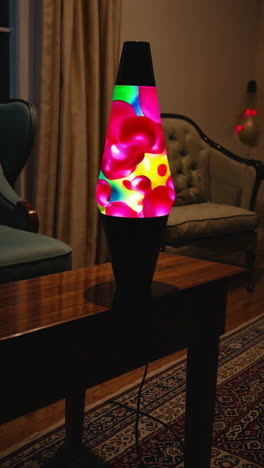 colorful lava lamp on a wooden table