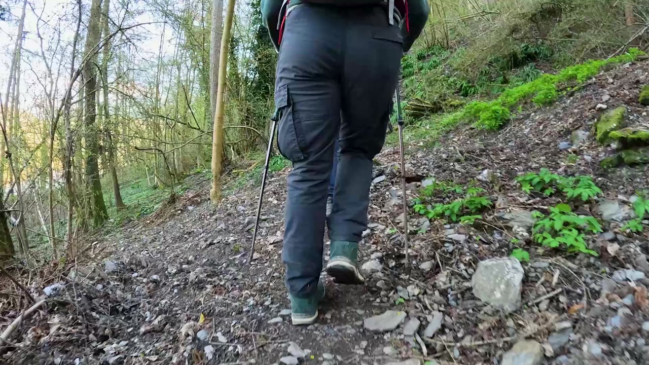 Video of people hiking uphill.