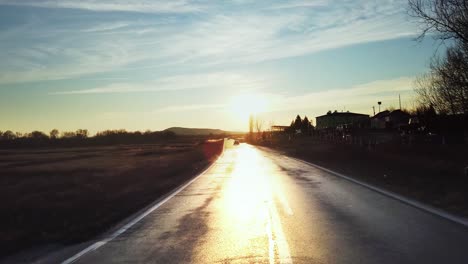 driving car point of view at sunset