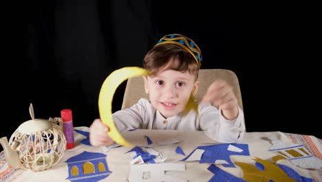 boy making crescent and star