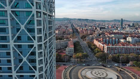 hotel arts foreground, plaza dels voluntaris olímpics and skyline, barcelona