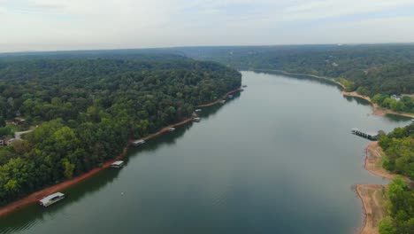 awesome descending aerial flight from high above the lake to barely above the lake
