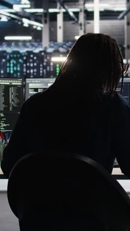 vertical video server room expert interpreting ai data analytics graphs, putting on headphones