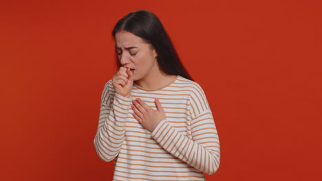 unhealthy woman coughing covering mouth with hand, feeling sick, allergy or viral infection symptoms