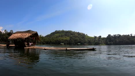 passing a loaded bamboo raft