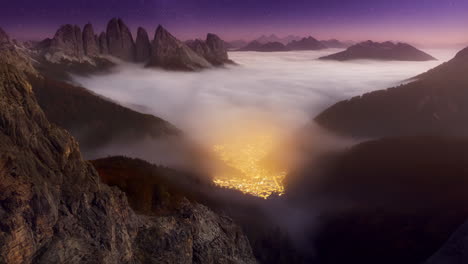 glowing city in a misty mountain valley at night
