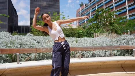 woman dancing in urban park