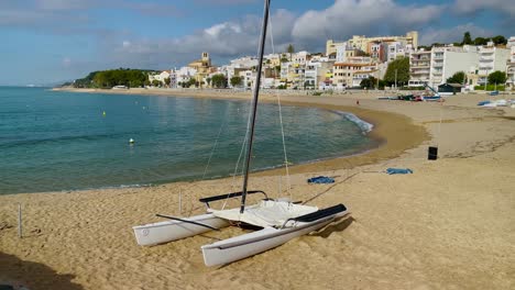 platja de les barques sea field maresme barcelona mediterranean coast plane close to turquoise blue transparent water beach without people