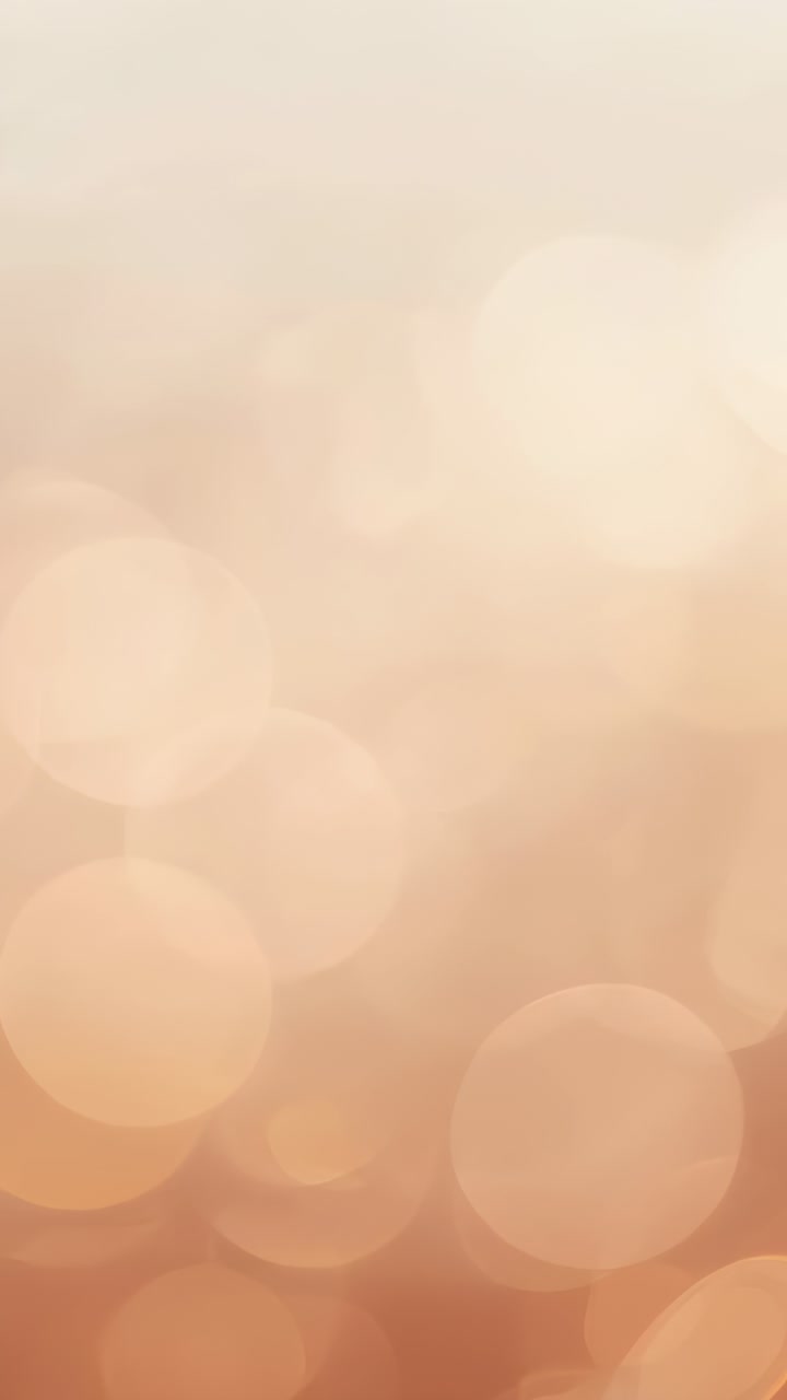 Video verticale: Motivo bokeh caldo e luminoso che reagisce ai cambiamenti di luce in una scena astratta che mostra dischi