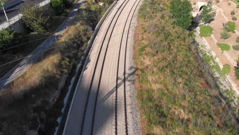 aerial view of train tracks in an urban landscape