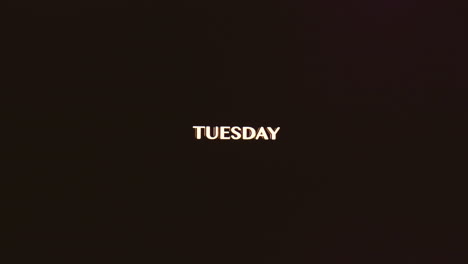 „Tuesday“-In-Cremefarbenem,-Gelbem,-Serifenlosem-Schriftzug-Glitzert-Mit-CRT-Effekt