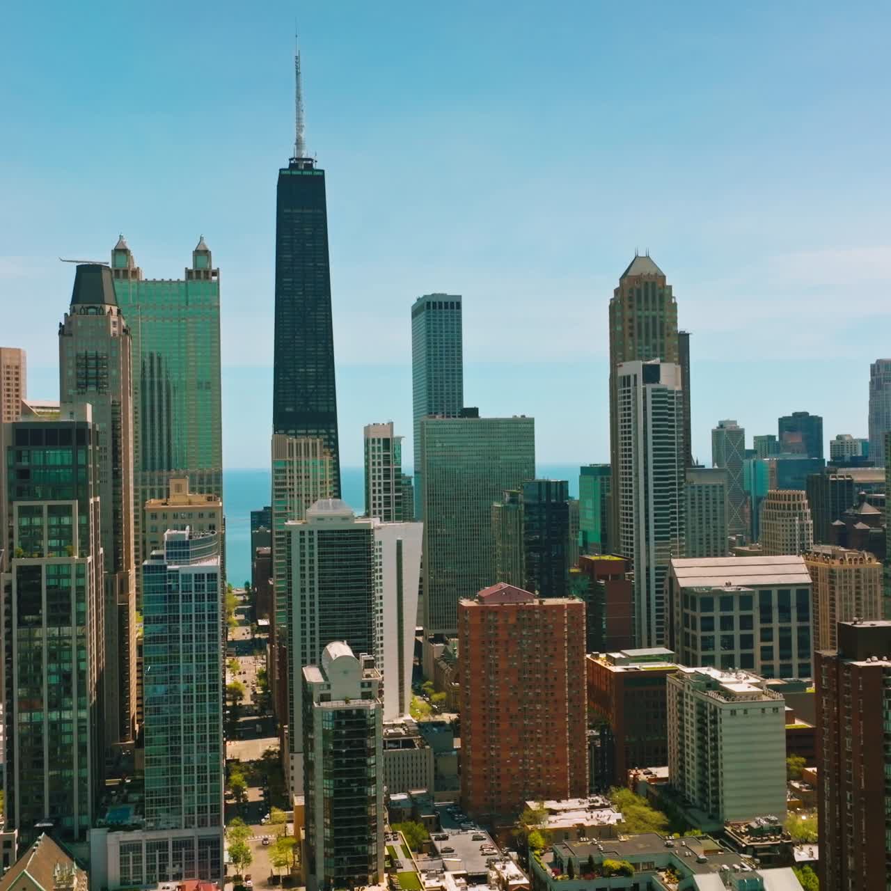 Amazing architecture of modern Chicago city, Illinois, USA. Sunny footage of skyscrapers against blue sky backdrop