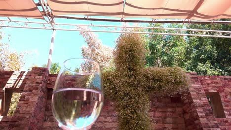 glass of chilled white wine on a sunny day