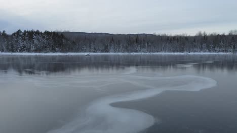 surface of lake frozen over winter aerial