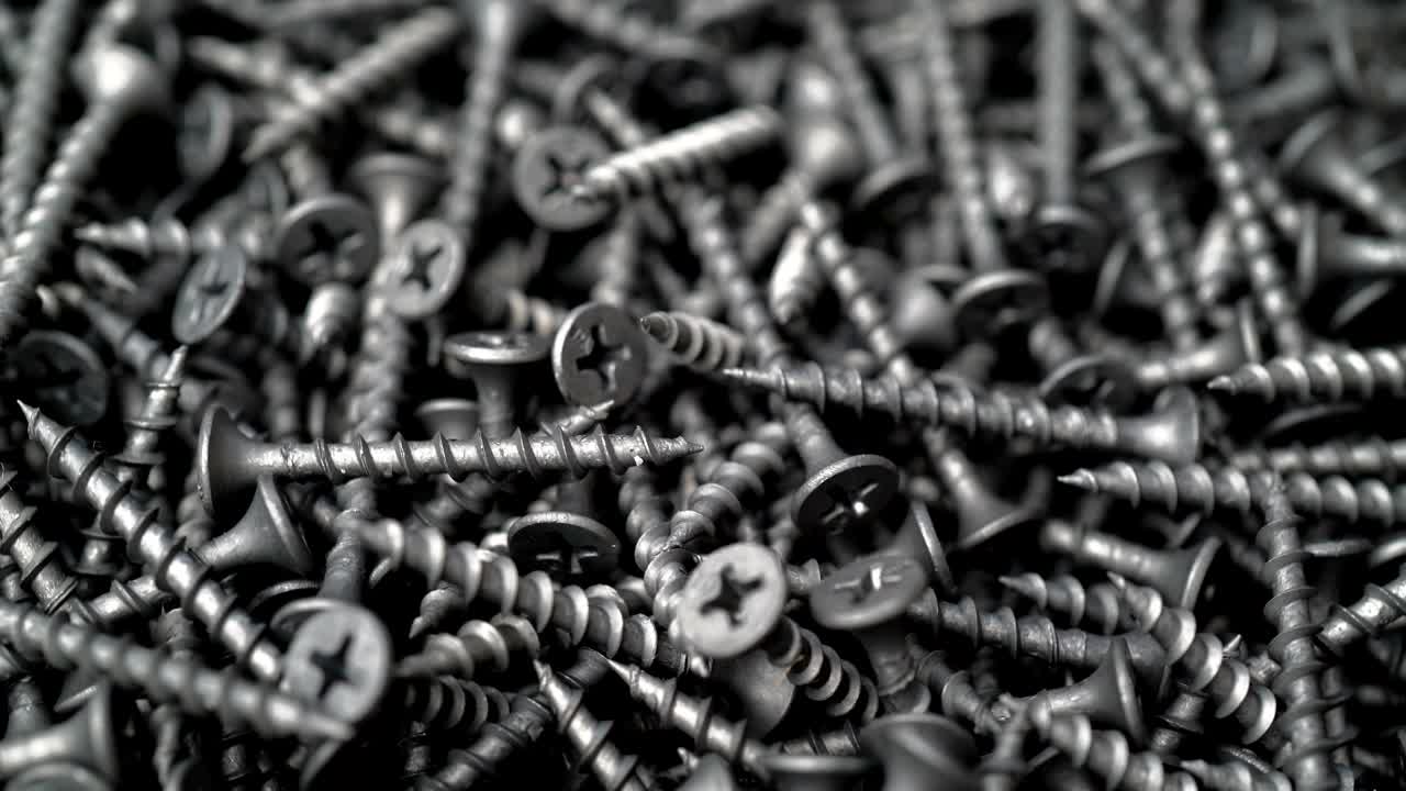 muchos tornillos de auto-tapeo rotan el fondo de movimiento