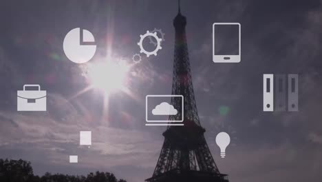 animation of multiple icons over eiffel tower against sun and cloudy sky